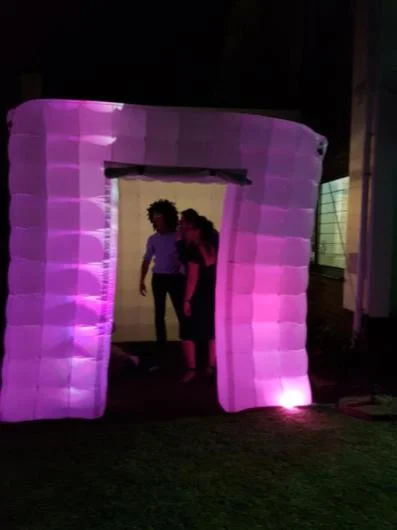White illuminated inflatable booth